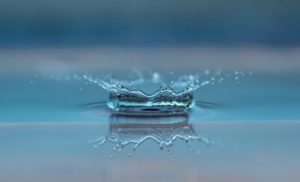 Water droplet splash blue